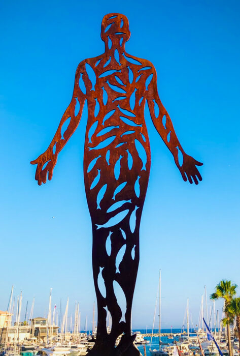 Sculpture by Rob Mulholland of steel hand cut figure for Port Frejus exhibition in France 2023